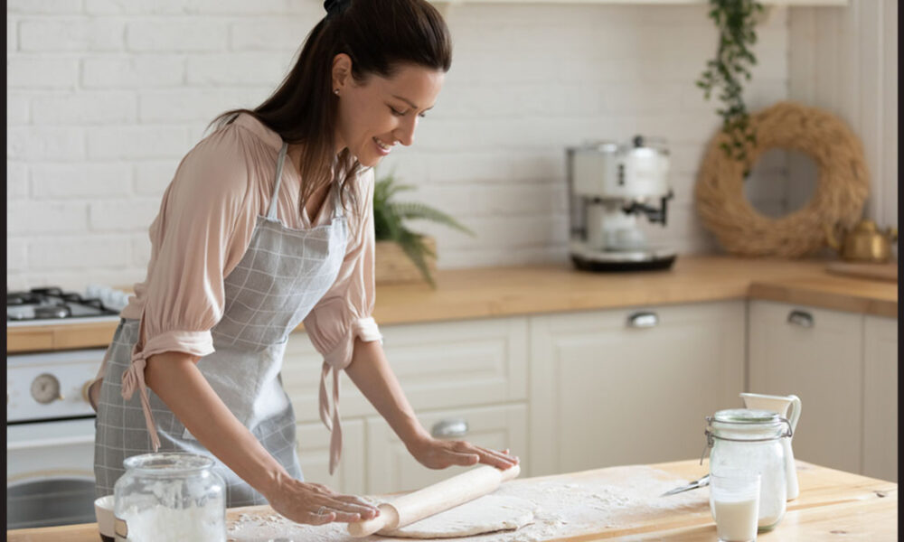 happyattractiveyoungadultwomanladyhousewifebakerwearapron