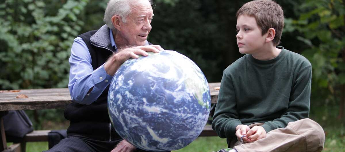 jimmy-carter-hugo-1200x530